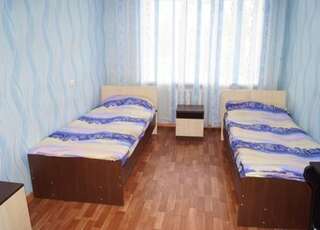 Гостиница 104 Комнаты Воронеж Кровать в двухместном номере с двумя отдельными кроватями-4